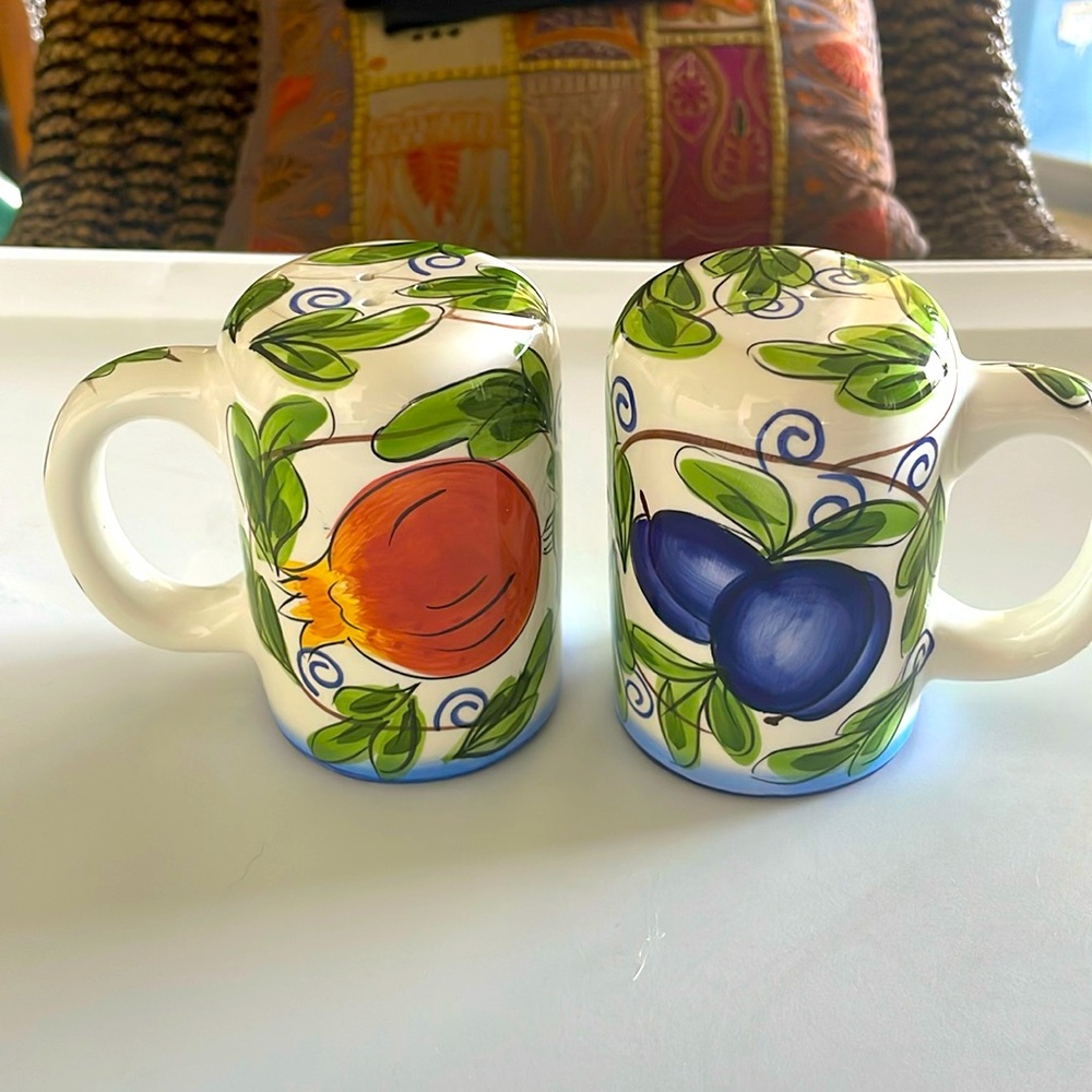 Vintage hand painted salt and pepper shakers.